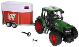 Duży traktor z przyczepą  do przewozu konia 